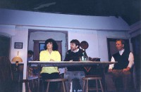 Rehearsal: Jackie, Peter Cornah and Jim at the table and Adam in the alcove