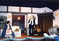 Marion Gadsby (Mrs Bradman) and Jim Harper (her husband) onstage while Val checks the script.
